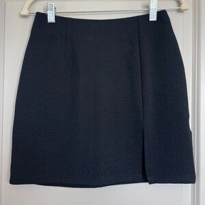 Black mini skirt with side slit